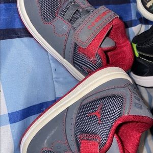 Grey and red baby Jordan size 4c .